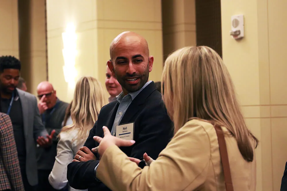 Healthcare market CEOs and industry leaders networking during a Health Management Academy event.