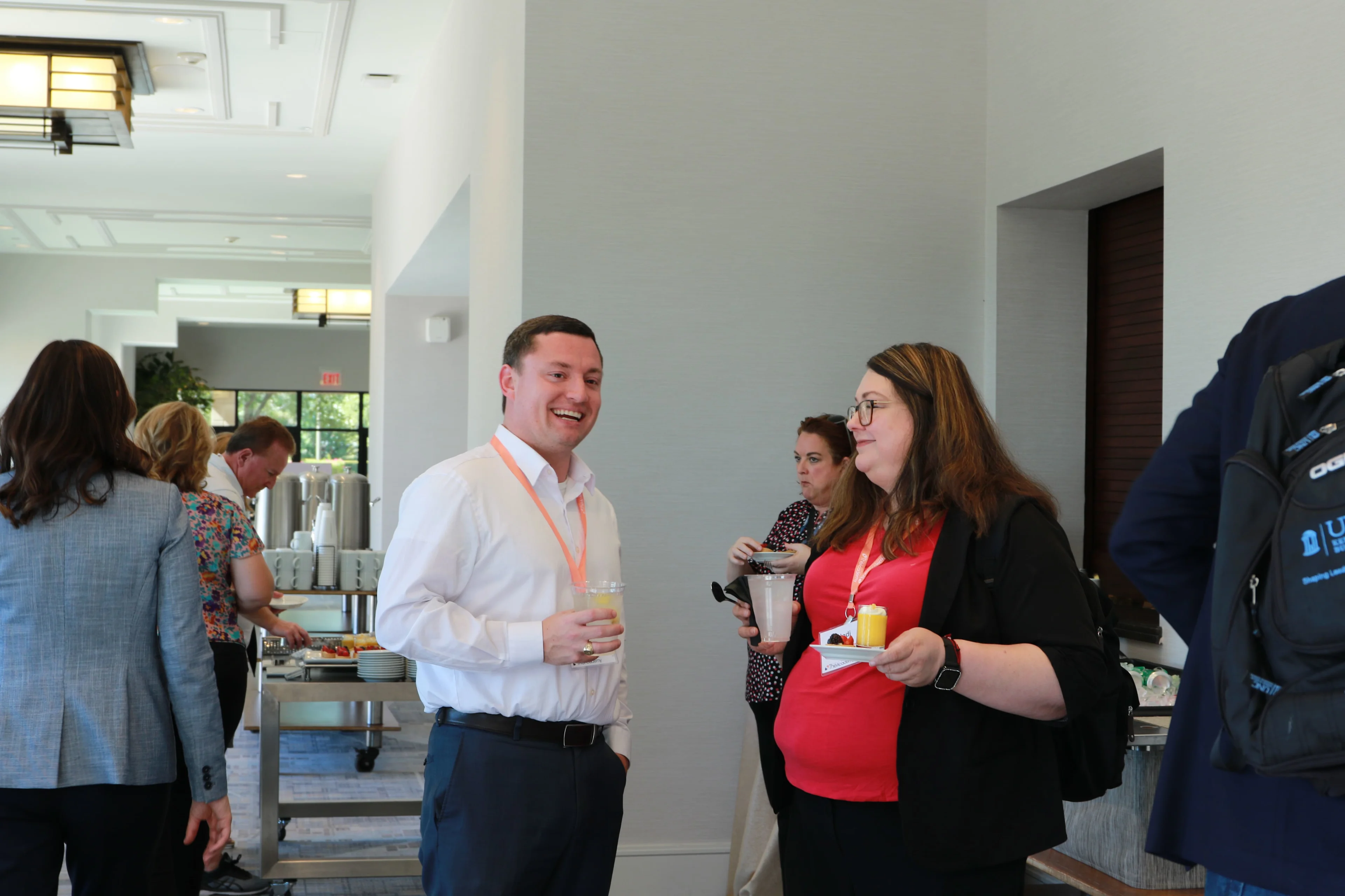 Leaders from top health systems exchanging ideas during a philanthropy healthcare leadership conference session.