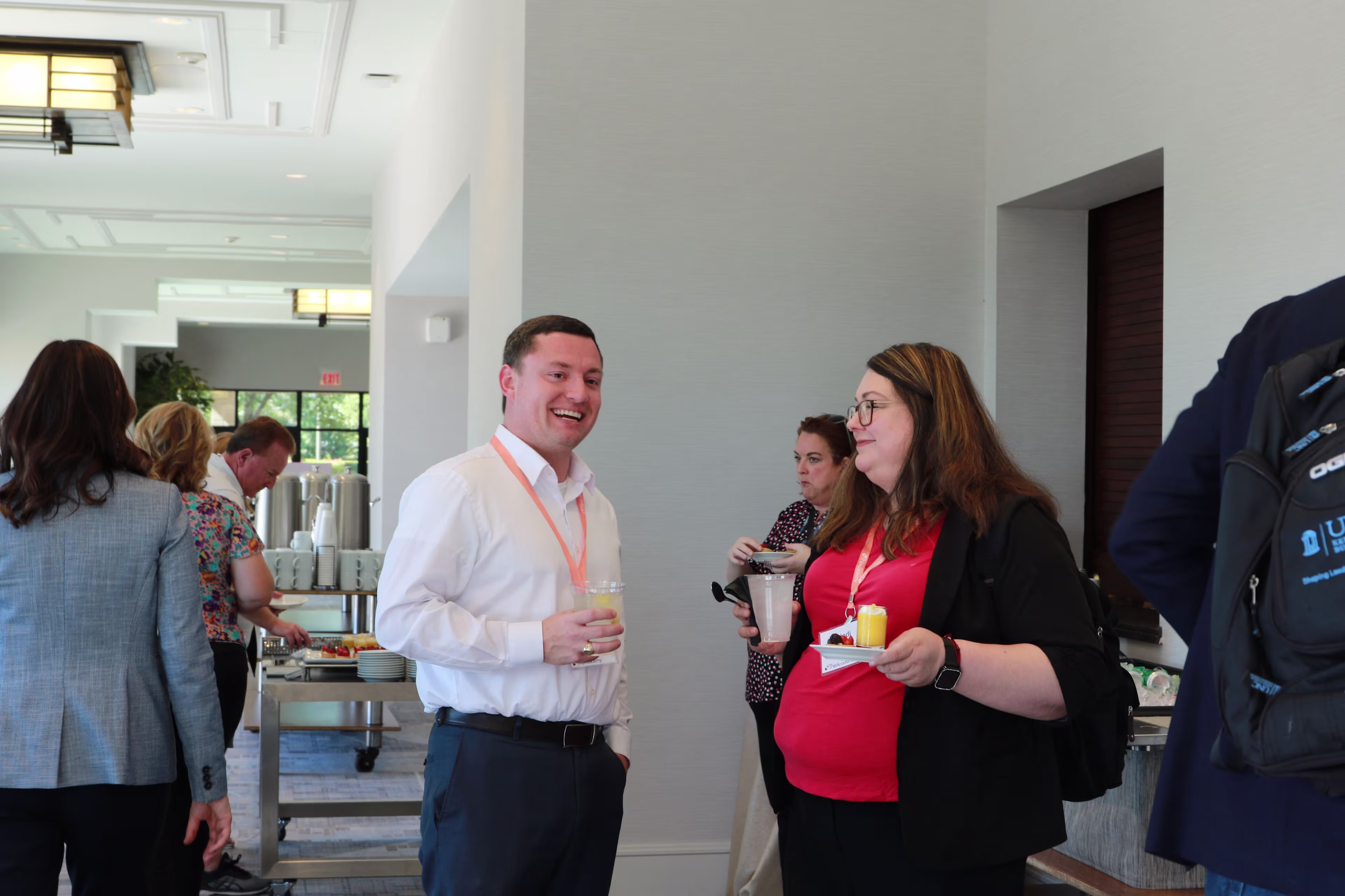 Leaders from top health systems exchanging ideas during a philanthropy healthcare leadership conference session.