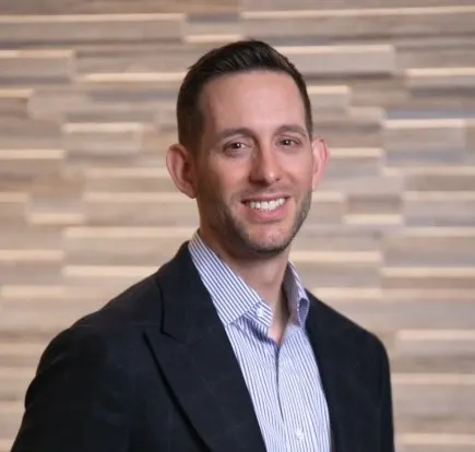 A headshot of Jimmy Phillips