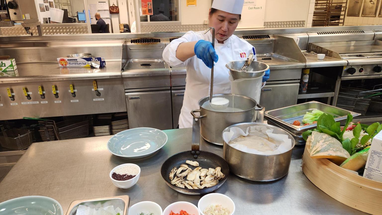 Image of chef cooking in the MCEC kitchen