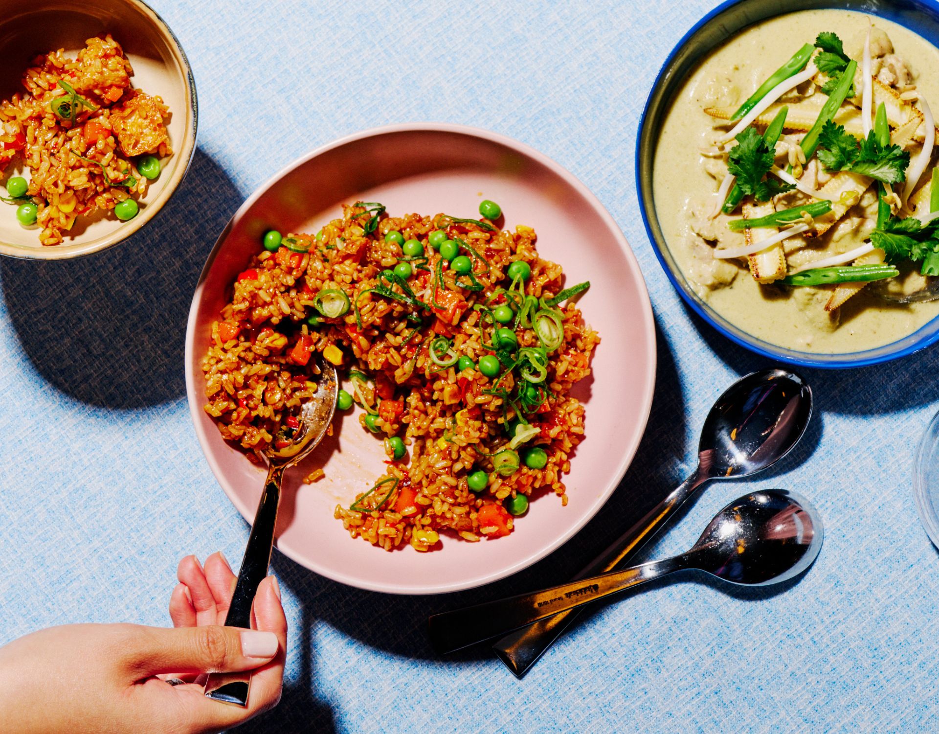 Pair of hands preparing a dish of sweet and sticky gochujang glazed Victorian beef brisket.