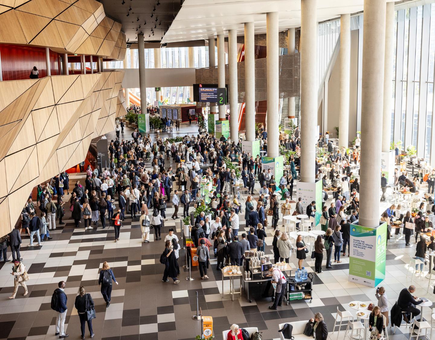 Large crowd gathered in the Convention Centre foyer. 