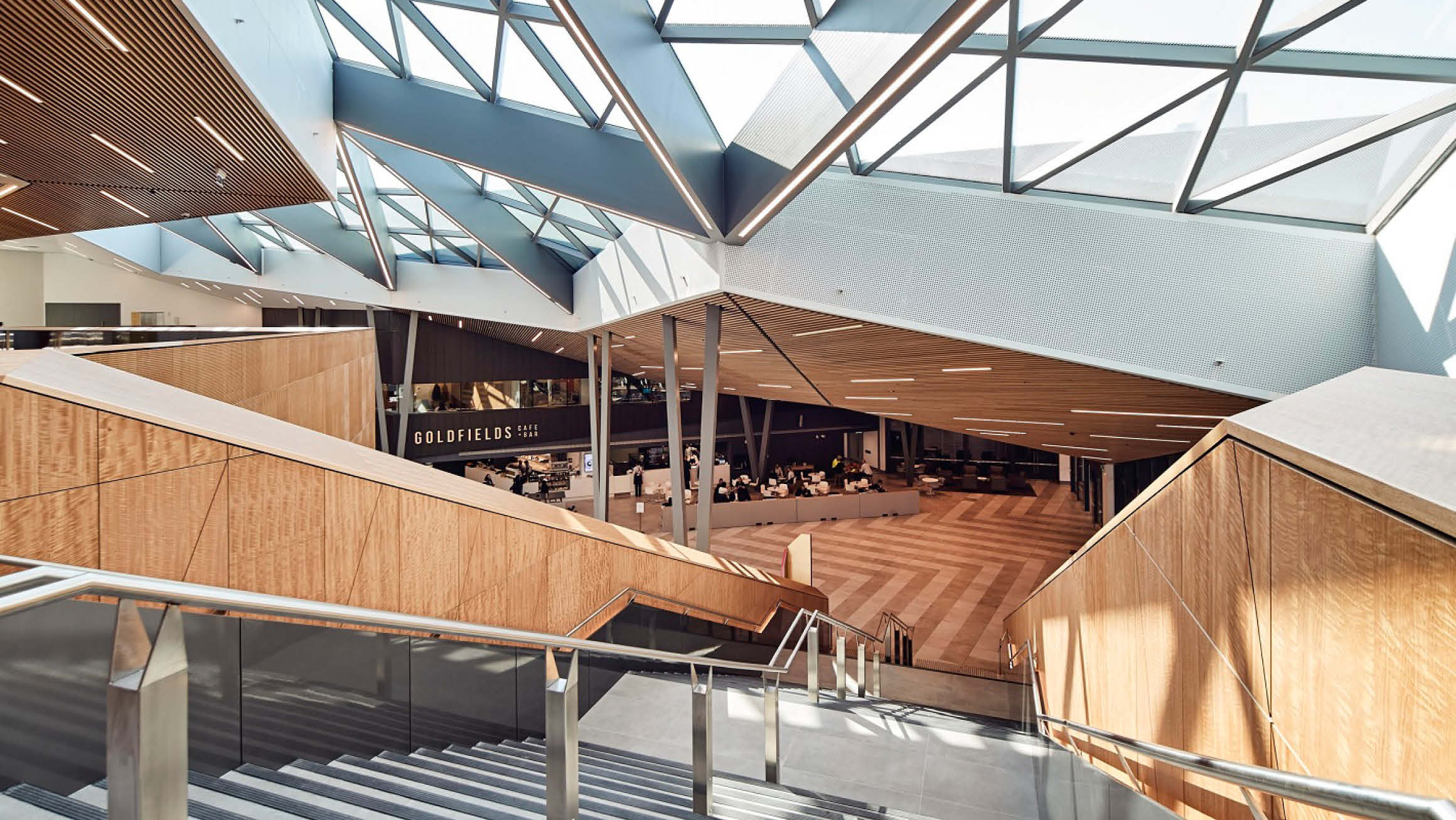 Over head view of a stair case leading down to the Convention Centre foyer. 