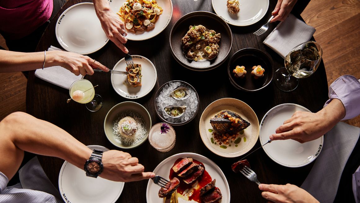 Shadow play hotel, interior shot of food dishes laid out on a table. 