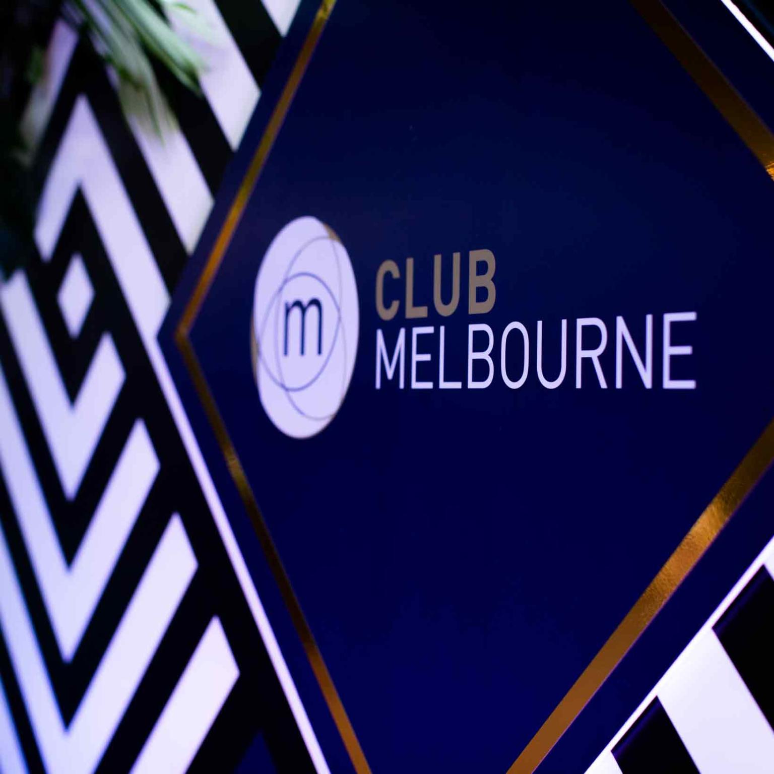 Zoomed in on the Club Melbourne logo on a sign. 