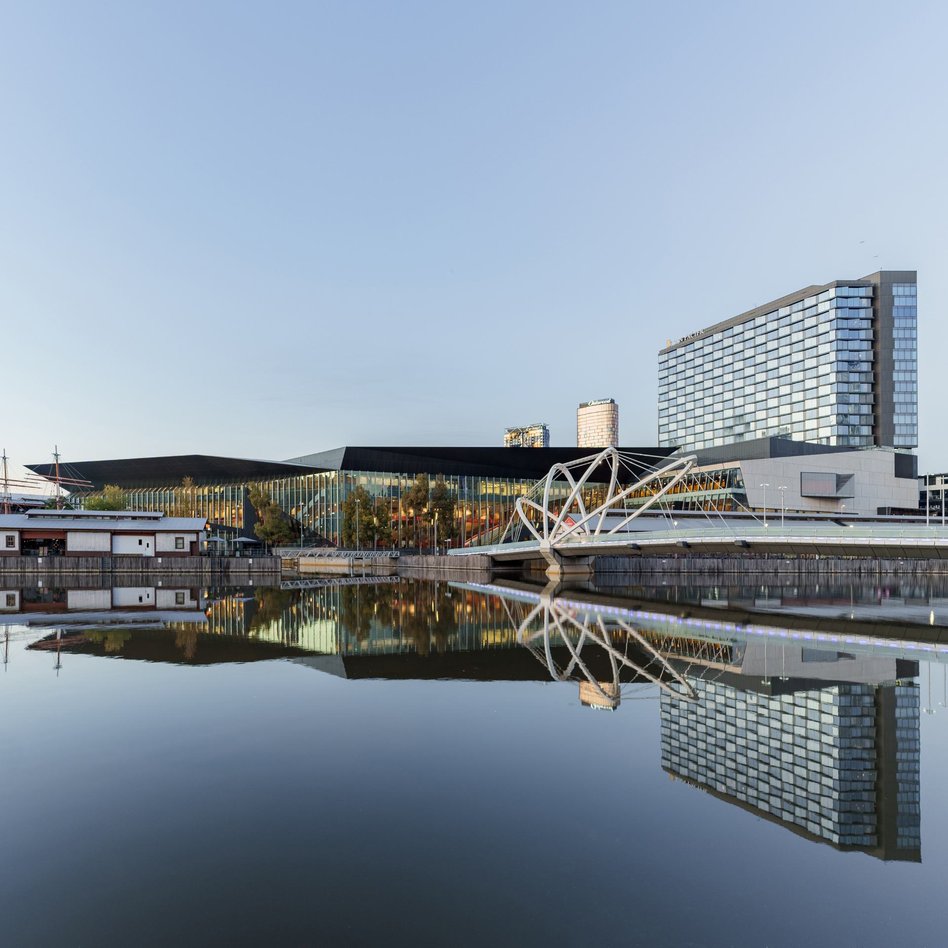 River view of MCEC with clear blue skies. 