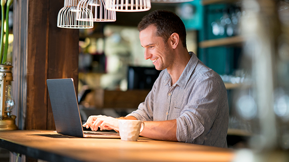 man looking at laptop