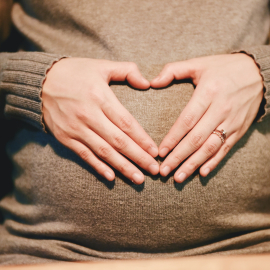 pregnant lady doing yoga