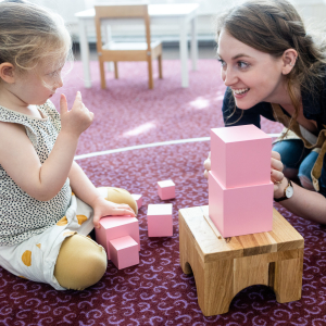 Montessori teacher and child