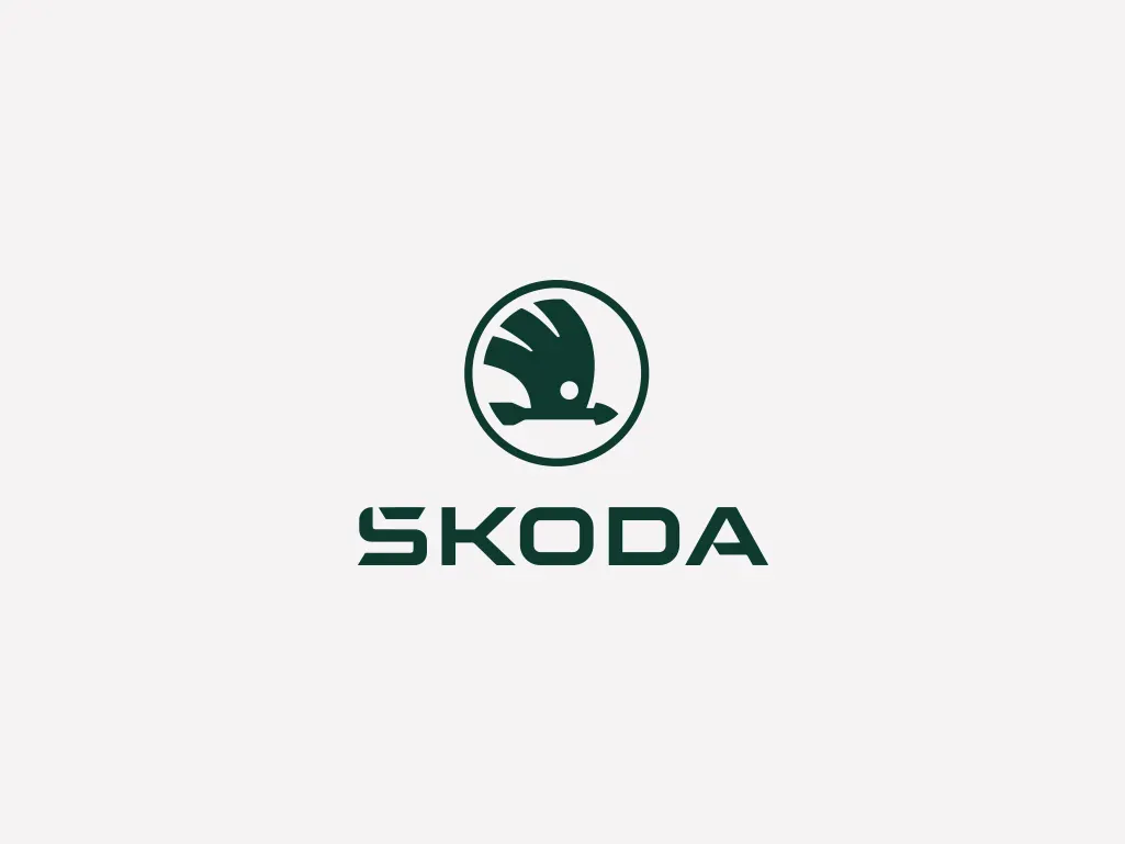 Ein Logo einer Fahrzeugmarke auf hellgrauem Hintergrund.