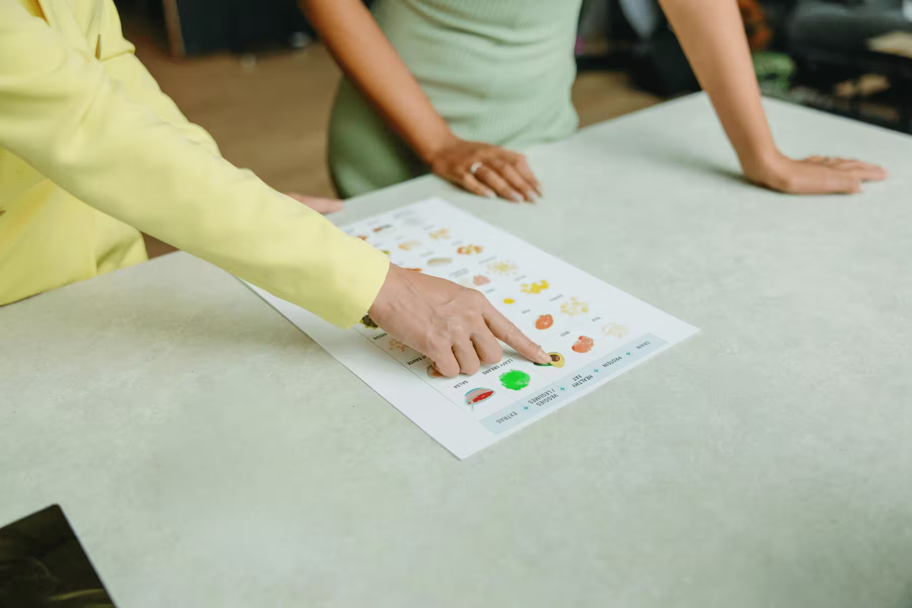 Dietitian recommending medically tailored meals to patient
