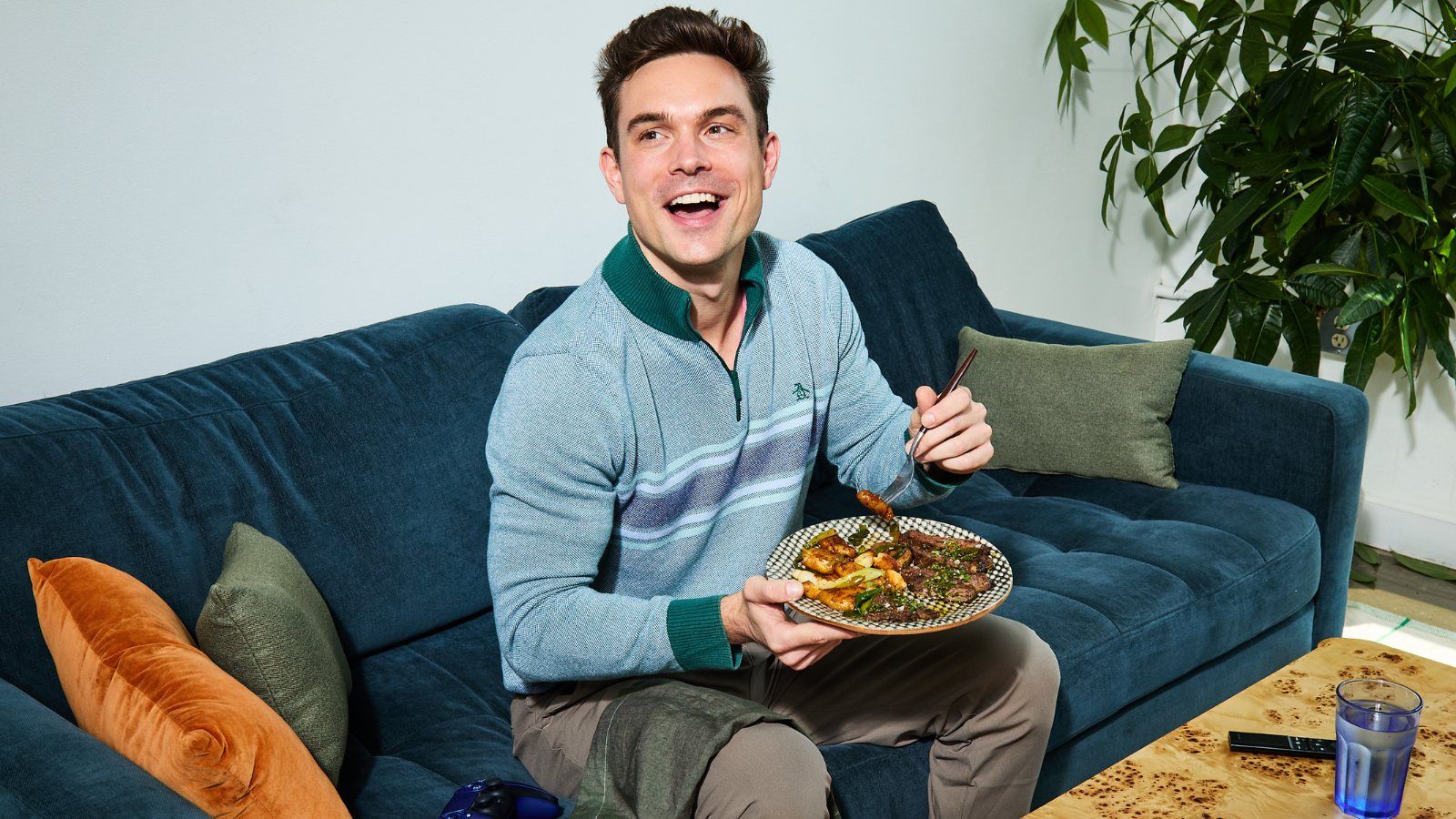 Residents enjoying fresh, chef-made meals inside a modern apartment building