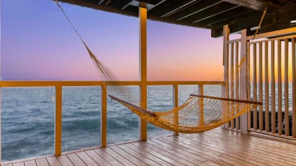 Oceanview deck with hammock and sunset views
