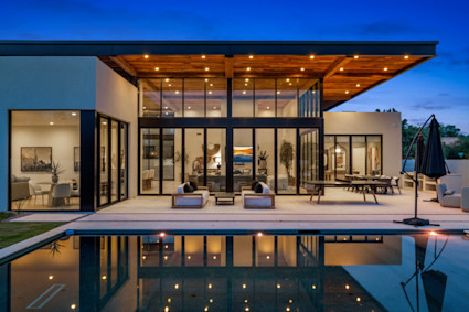 Tulum Oasis showcases resort-style outdoor living, with a pool and patio area perfect for entertaining after a day of golf in Scottsdale.