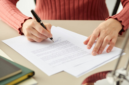 Person signing a document