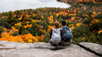 A couple enjoying one of the best romantic fall getaways.