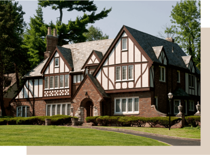 An image displays a traditional Tudor home, one of the main types of houses.