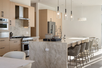 Modern kitchen at Desert Ridge in La Quinta, ideal for hosting before and after tournament days during The American Express.