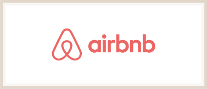 A logo of Airbnb, one of the many Plum Guide alternatives.