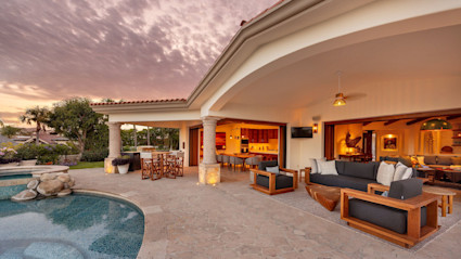 Cabo terrace with outdoor bar and lounge illustrates 2025 indoor outdoor entertaining trends for warm weather markets.