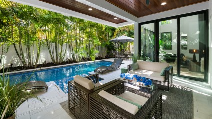 Outdoor space with pool and seating
