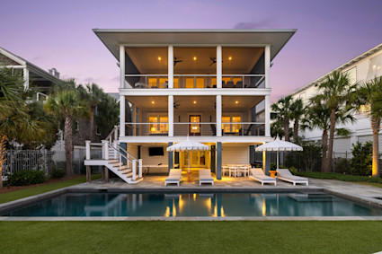 Charleston Blvd offers a pool, multiple porches and quick beach access on Isle of Palms, creating a refined coastal base near historic Charleston.
