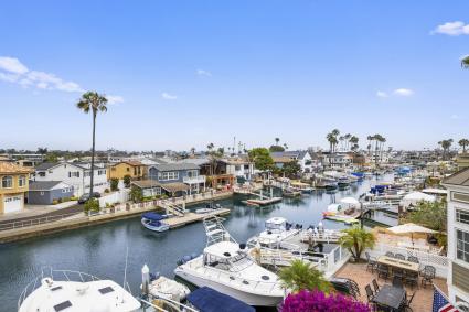 Canal lined with homes, boats and docks