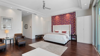 Vibrant bedroom with fun wallpaper