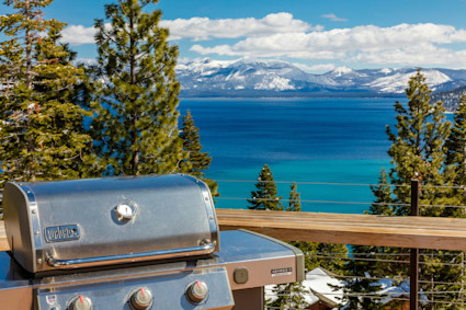 Property view of water featuring a mountain view at 495 Lakeridge Ct, Tahoma, CA 96142. This image highlights the serene lake setting ideal for water sports in Lake Tahoe, CA.