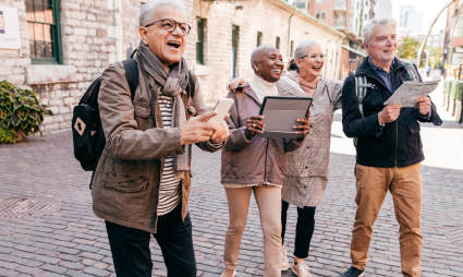 A group of people enjoy a guided tour while exploring what to do after retirement.