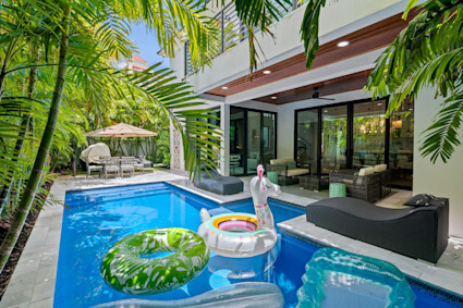 Vista Park’s pool, patio, and open living create a seamless South Florida holiday setting for gatherings.