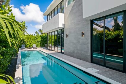 a pool outside of a house