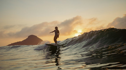 A Maui sunset surf captures the island’s intimate, adventurous energy for couples planning a romantic coastal escape.