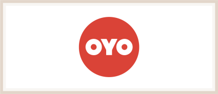A logo of OYO, one of the many Plum Guide alternatives.