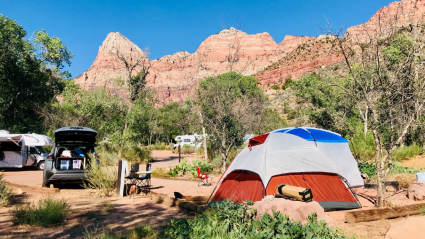 A photo of people camping in Zion National Park, one of the many empty nest ideas to try.