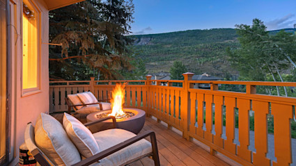 A cozy Vail patio shows how outdoor spaces and fire pits become focal points for Thanksgiving gatherings and fresh alpine air.