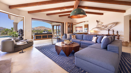 Casa Bella’s open-plan living, high beamed ceilings, and seamless transition from indoor to outdoor lounge spaces are characteristic of Cabo’s finest vacation homes.