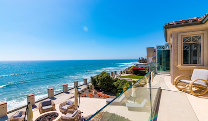 Rear exterior of the Neptune Bluffs rear with panoramic views of the ocean