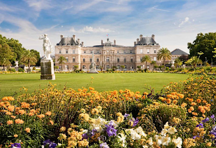 A stock photo shows a castle surrounded by flowers at St. Germain des Prés.