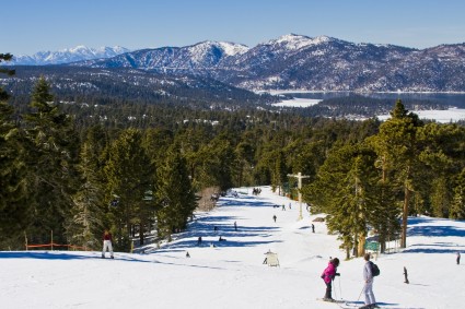 a group of people skiing on a snowy mountain