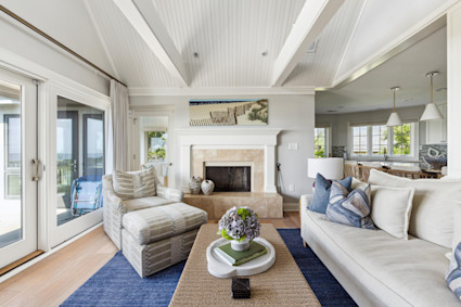 Shipwatch features a bright living area with ocean views—ideal for gathering after a day of island adventures or as a quiet midpoint for family during the festivities.
