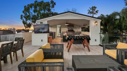 rooftop deck with games and kitchen
