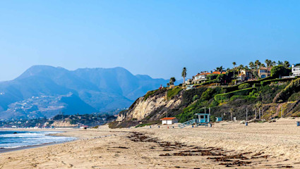 A photo of Malibu, California serves as inspiration for a momcation.