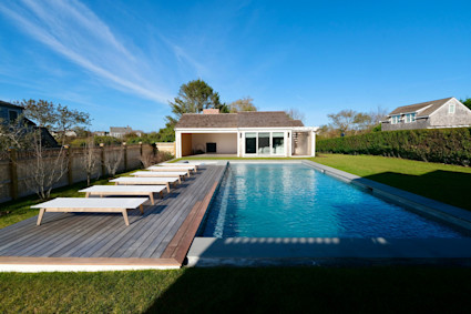 Poolside outdoor living at Cedar Isle, a natural fit for Nantucket summer days that start at the beach and end with relaxed entertaining at home.