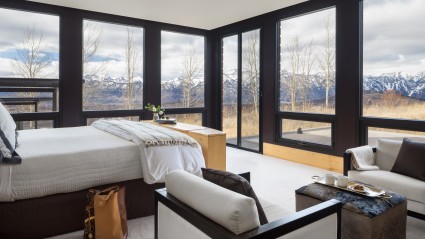 Primary bedroom with views of mountains