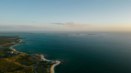 Aerial coastline view sets the tone for Punta de Mita surf access and the day to day rhythm of ocean focused living.