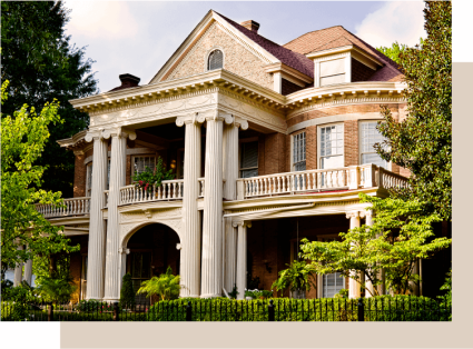 An image displays a traditional Greek Revival home, one of the main types of houses.