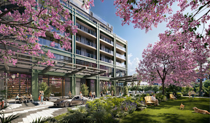 Modern luxury residence framed by pink flowering trees, with lush gardens, outdoor dining, and a vibrant street scene.
