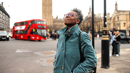 Woman walking through London.